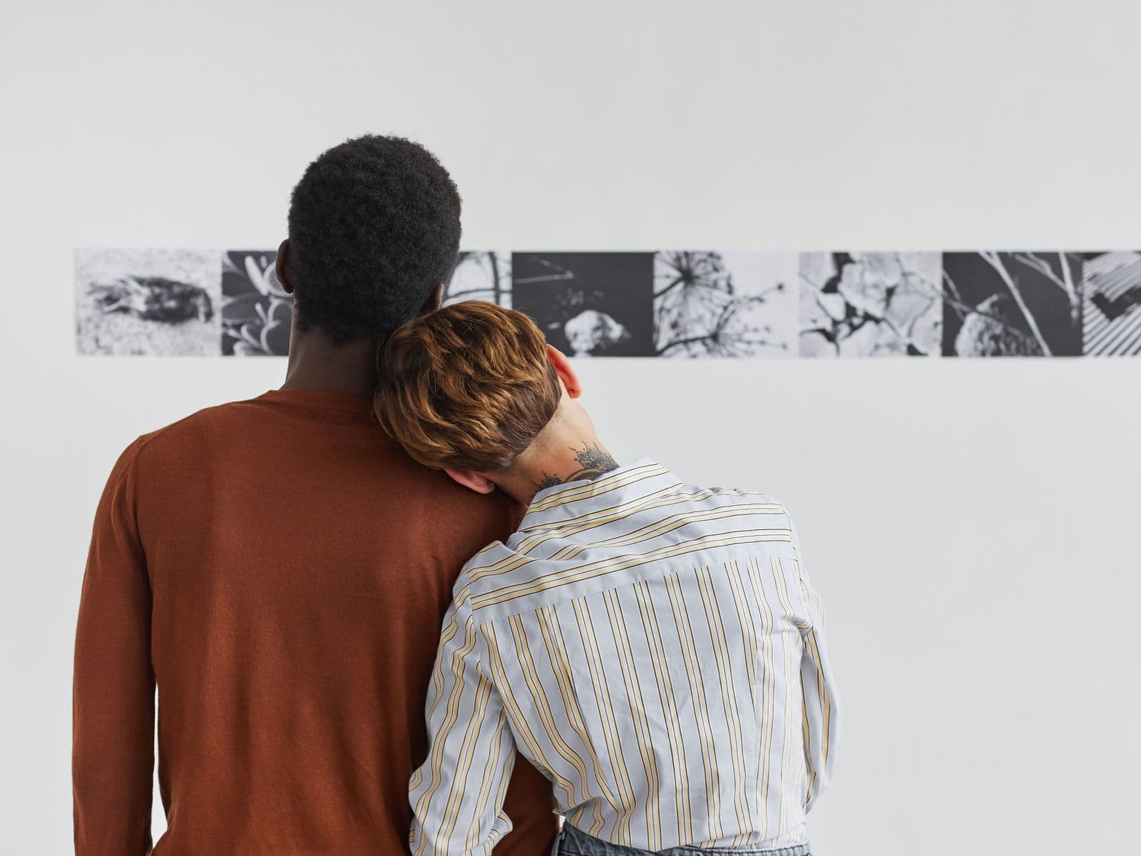 Visitors viewing large works in a museum gallery